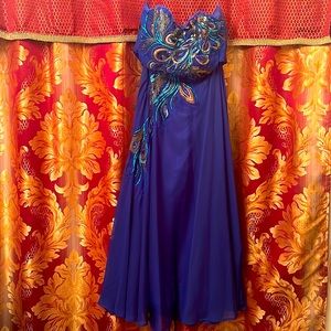 Ostrich design, strapless, tie in back like corset.